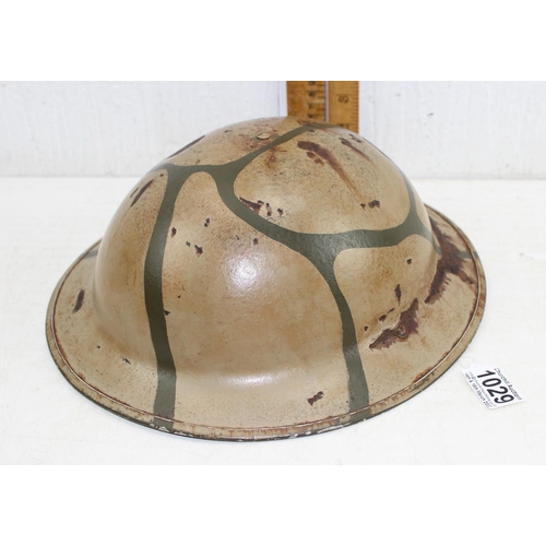 1029 - WW2 period British military Brodie helmet, dated 1942 to both helmet and liner, with unusual painted... 