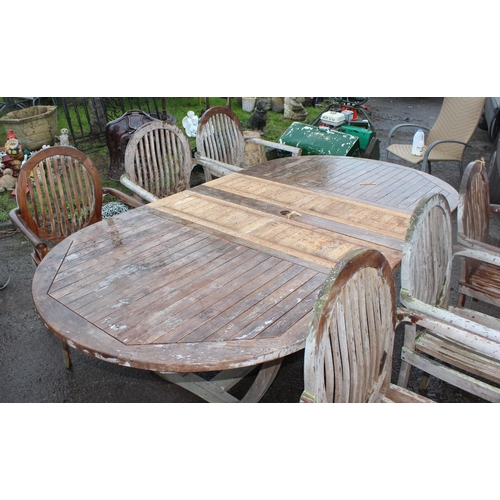 341 - Large teak garden table with 6 teak garden chairs and grey & white cushions