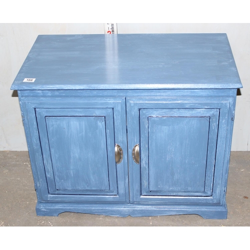 196 - A painted wall cupboard, denim finish