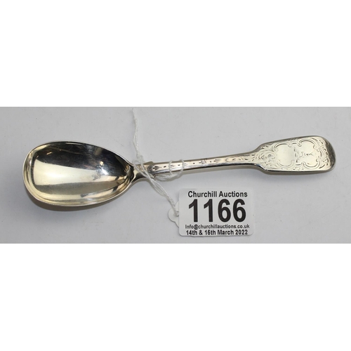 1166 - An antique Dublin silver spoon of unusual rounded form, engraved armorial, Dublin 1860 by John Smyth... 