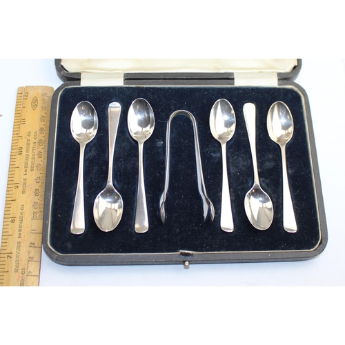 1173 - A boxed set of 6 silver tea spoons and sugar tongs, Spoons Sheffield 1921, tongs Birmingham 1869, ap... 