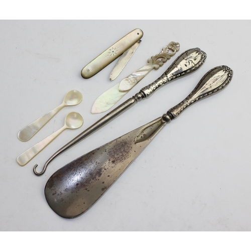 1175 - Silver handled shoe horn, button hook, silver bladed fruit knife with mother of pearl scales and oth... 