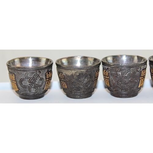 1178 - Set of 6 late 19th/ early 20thC Chinese carved coconut shell or similar silver or white metal lined ... 