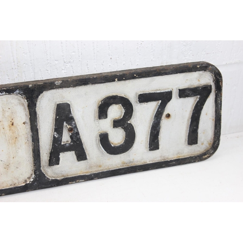 526 - An early to mid 20th century cast iron road sign, 'Exeter 1 Mile A377'