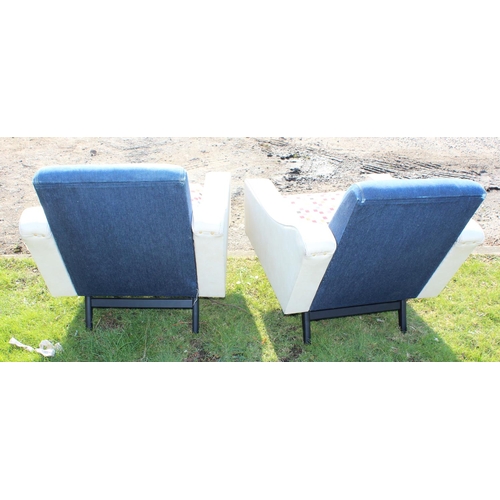 195 - A pair of retro 1950's armchairs