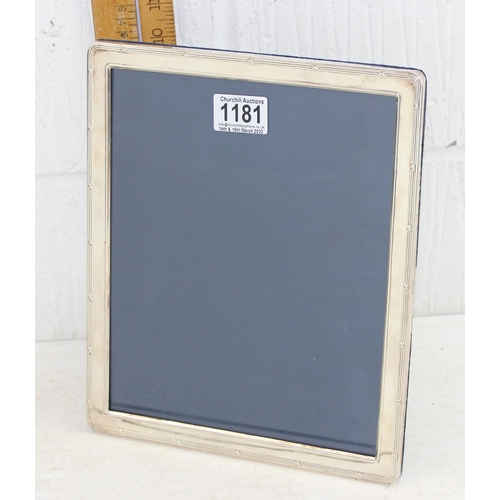 1181 - A large silver picture frame, approx 11