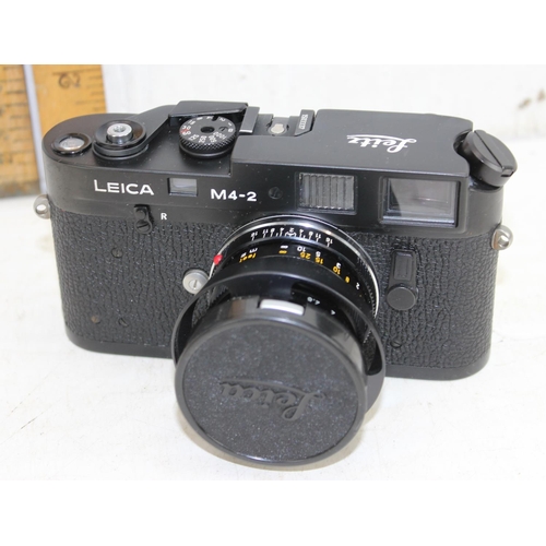 725 - Leica M4-2 camera with Summicron 1:2/50 lens, camera body made in Canada, lens in Germany, with orig... 