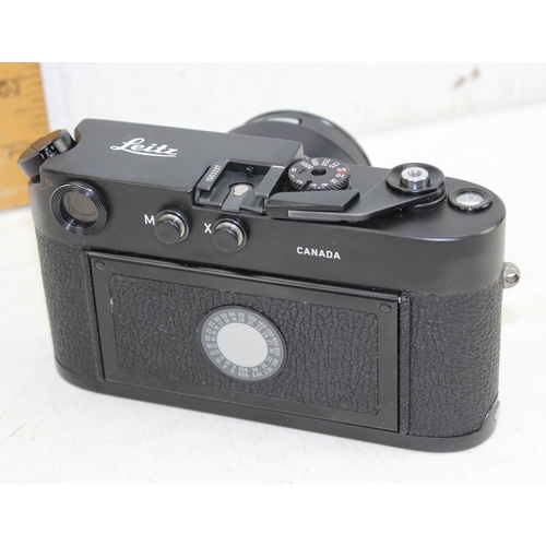 725 - Leica M4-2 camera with Summicron 1:2/50 lens, camera body made in Canada, lens in Germany, with orig... 