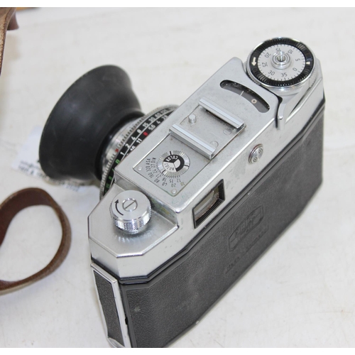 731 - Carl Zeiss Ikon Contina camera with Pantar 1:2.8 f=45mm lens, with rubber attachment and leather cas... 