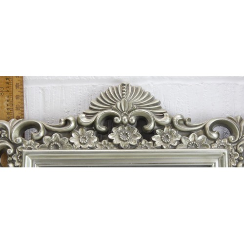 447 - A large Rococo style silvered frame mirror