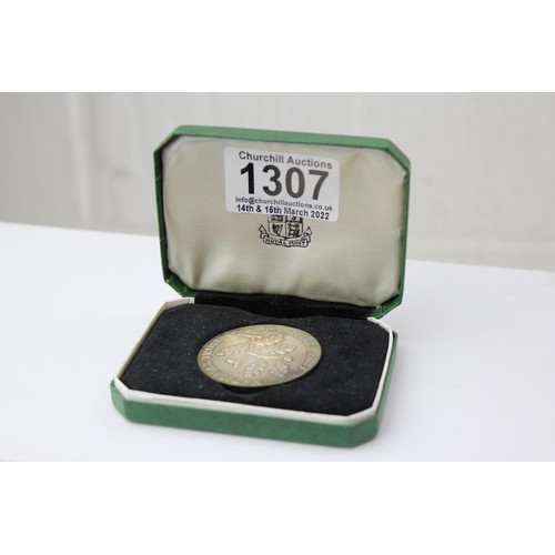 1307 - A silver National Trust Medallion named to Audrey Spencer Willis, approx 25.25g gross, in original R... 