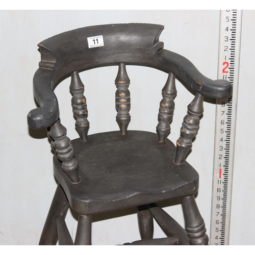 11 - A vintage painted child's high chair, smokers bow style