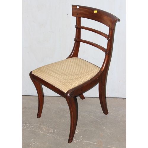 28 - A set of 6 late Regency or William IV rail back mahogany dining chairs with drop in seats and sabre ... 