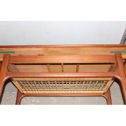 31 - Retro coffee with wickerwork magazine rack and extending ends, likely Danish but unmarked