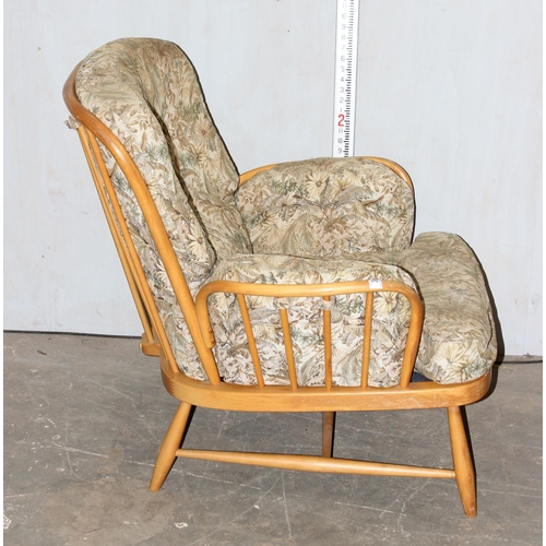 34 - Ercol armchair with stick back and upholstered cushions
