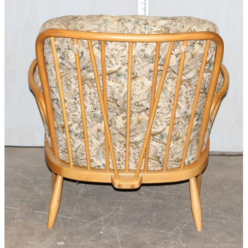 34 - Ercol armchair with stick back and upholstered cushions