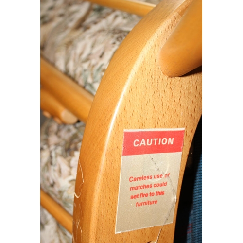 34 - Ercol armchair with stick back and upholstered cushions