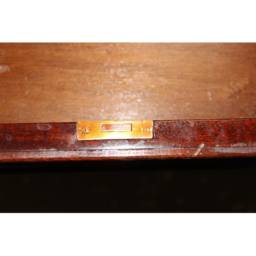 42 - A 20th century large 2 drawer mahogany effect library table with tooled leather top