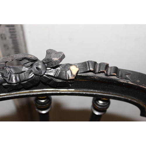 74 - Antique ebonised bedroom chair with carved details