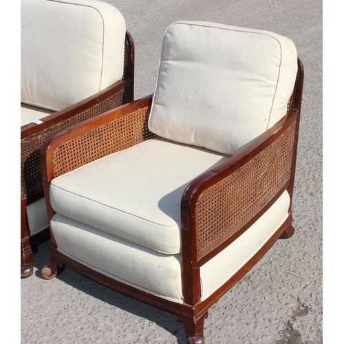 87 - An Art Deco period bergere seated sofa and armchair with mahogany frame