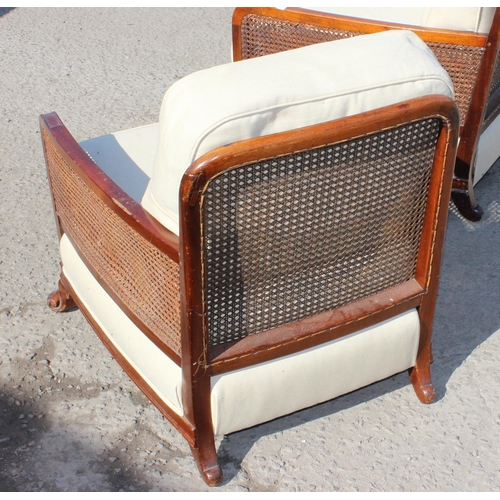 87 - An Art Deco period bergere seated sofa and armchair with mahogany frame
