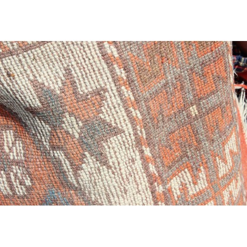 218 - A vintage small rug of cream ground with 3 medallions, approx 140cm x 87cm