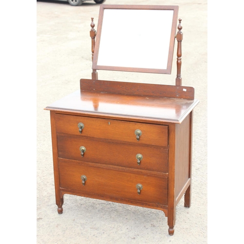 104 - A vintage dressing table chest with mirror