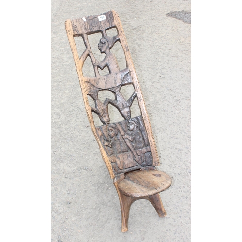 108 - African carved wooden birthing chair