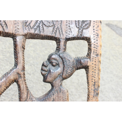 108 - African carved wooden birthing chair