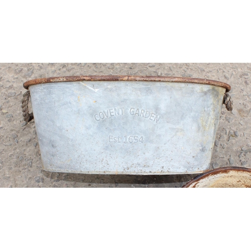 324 - 2 galvanised metal tubs and a galvanised watering can