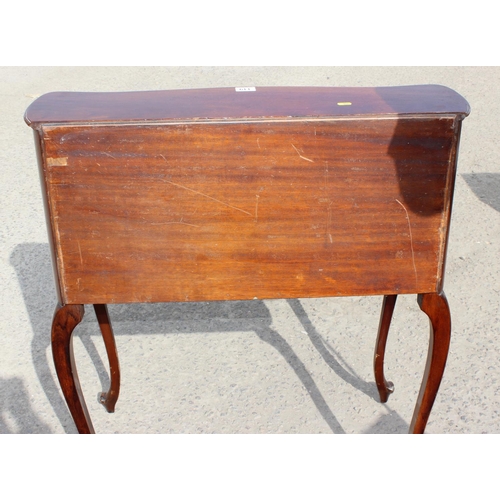 119 - An antique style Mahogany ladies writing desk with drawer, drop down front and carved details