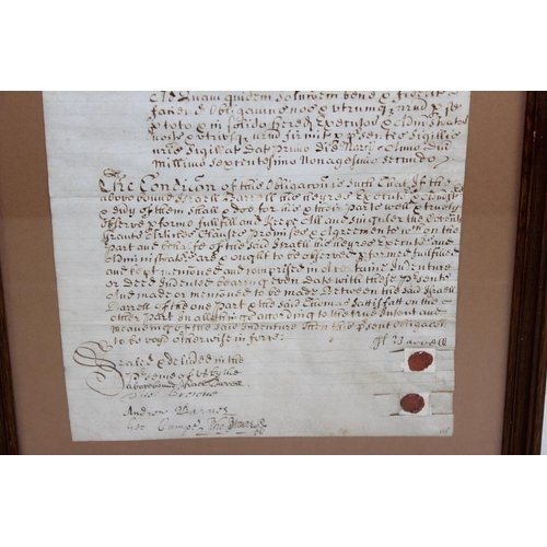 463 - An antique framed legal document with wax seals