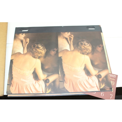 560 - 3 Pirelli calendars, 1972, 73 & 74 and a plastic calendar holder