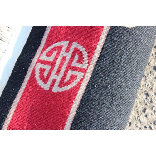 225A - An unusual black and red ground rug Chinese thick pile rug