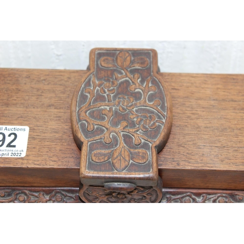 292 - An unusual Chinese carved wooden box with strap hinge, possibly a card or games box, likely early 20... 