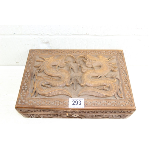 293 - An Oriental carved wooden box decorated with dragon and other mythical beasts, likely early 20th cen... 