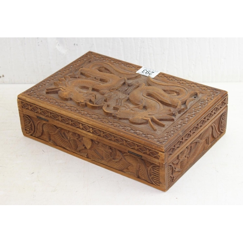 293 - An Oriental carved wooden box decorated with dragon and other mythical beasts, likely early 20th cen... 