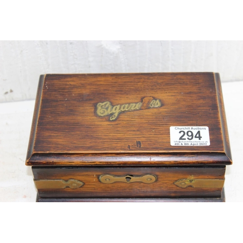 294 - An Art Deco period oak Cigarette box