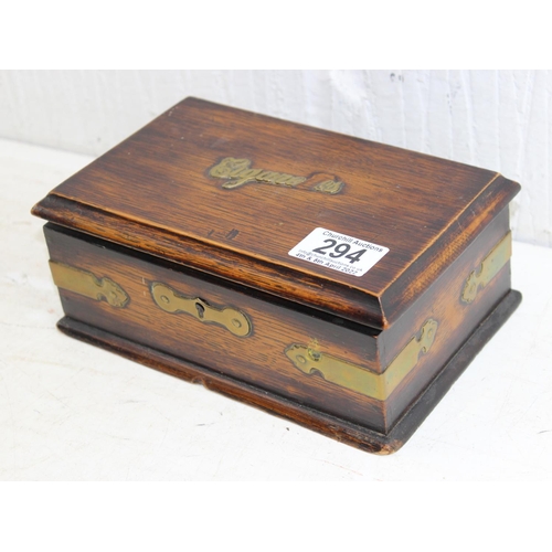 294 - An Art Deco period oak Cigarette box