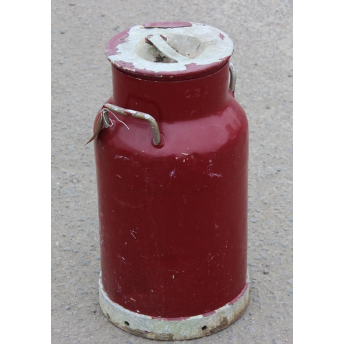 380 - A 1950's dated toleware painted aluminium milk churn, dated