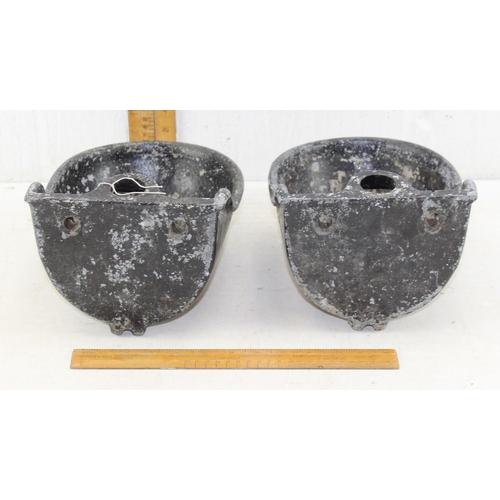 383 - A pair of vintage cast and painted metal wall mounted small water or animal feed troughs or bowls