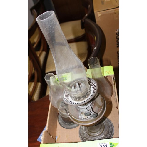 241 - 2 brass oil lamps with glass chimneys & 1 spare