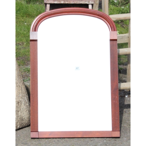 458 - A large wooden framed overmantel mirror with arched top