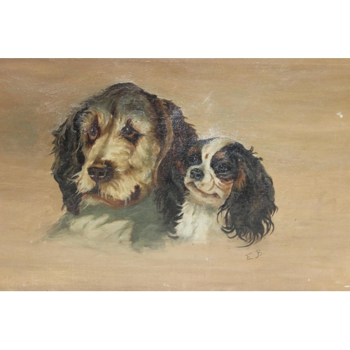 467 - Oil on canvas portrait of two dogs to include a King Charles Cavalier, signed E.B