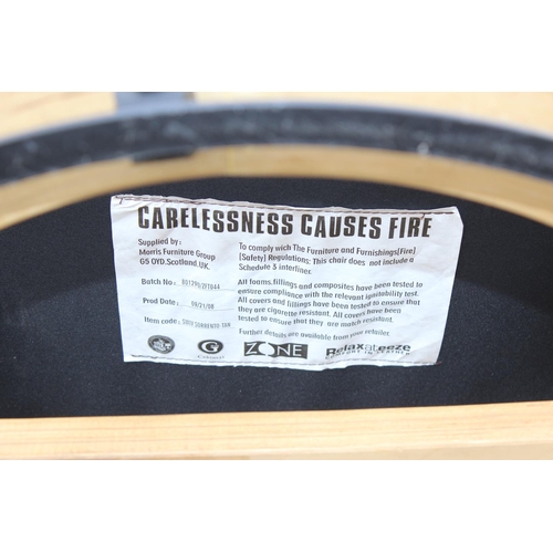 130 - Ekornes style armchair and footstool