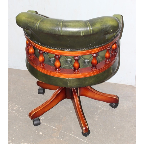 150 - A green Chesterfield leather captain's desk chair