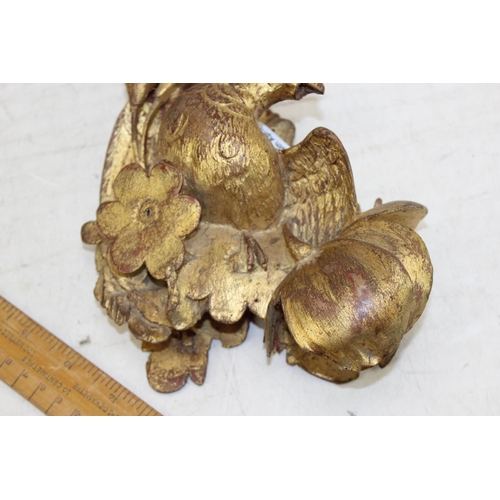 283 - Antique gilt limewood carving of a bird amongst foliage, likely 19th century