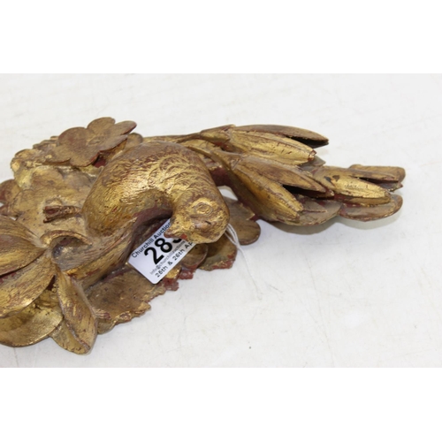 283 - Antique gilt limewood carving of a bird amongst foliage, likely 19th century