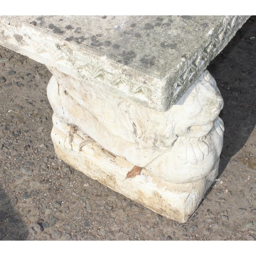 307 - Ornate concrete garden bench with dog supports