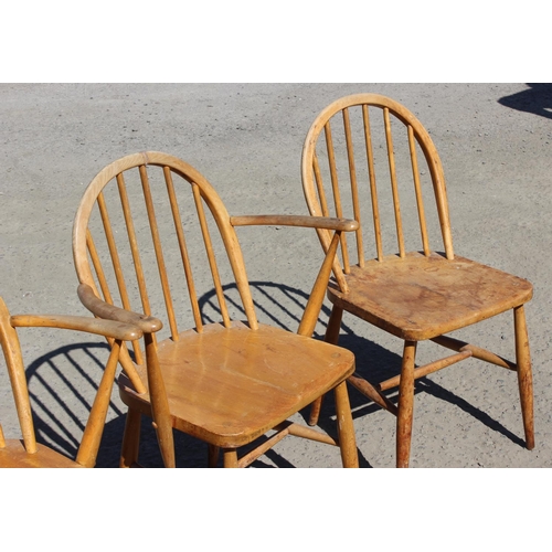 176 - A set of 4 early Ercol hoop back chars, 2 dining & 2 carver, unusual printed label and stamped 290